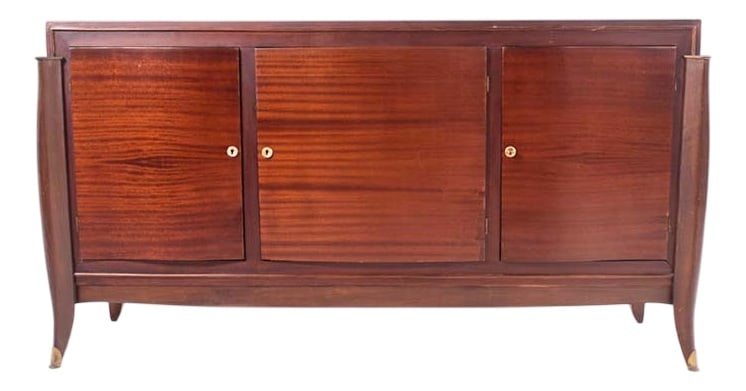 Mid-Century French Sideboard by Jules Leleu, 1930: Impressive French sideboard by famous designer Jules Leleu, showing the quality of its time, 1930's. Consisting of four doors, with interior two drawers and shelves. It is adorned with brass