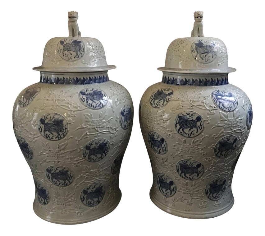 Porcelain Blue and White Giant Jar Vases, Set of 2: This pair of elegant and fine giant jars in porcelain, has its origin in the extremely part of the Chinese continent, probabily from the Japan. The entire surface is decorated with the relief of