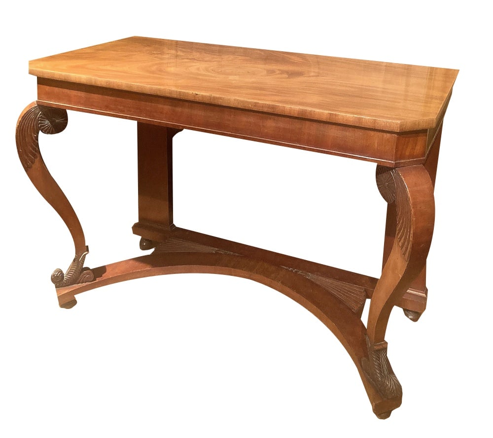Art Nouveau Italian Wooden Console Table: This Italian early 20th century cherrywood console table or writing desk is a fine Art Nouveau period piece of furniture. Its beautiful mellow honey colour and stylishly curved pillars supporting the