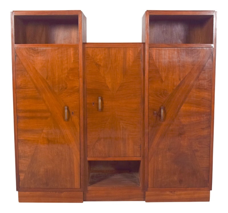 3-Door Bookcase, 1920s: Three-door bookcase. With a symmetrical and robust design, it has three main compartments with doors, as well as open niches at the top of the sides. The doors have vertical handles and marquetry