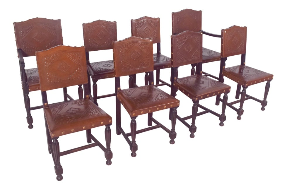 Chairs with Studded Leather Backs and Seats, Set of 8: Set of eight chairs with backs and seats in studded leather. Two of the chairs have armrests, the structure is made of turned wood and the seat and back are covered in distressed leather with
