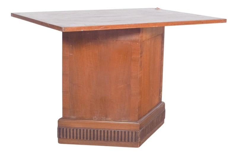 Vintage European Table with Base Unit and Door, 1950s: Table with base unit and door. with a unique design, the central base is robust and trapezoidal in shape, giving the furniture stability and grandeur. The structure is made entirely of wood, finished