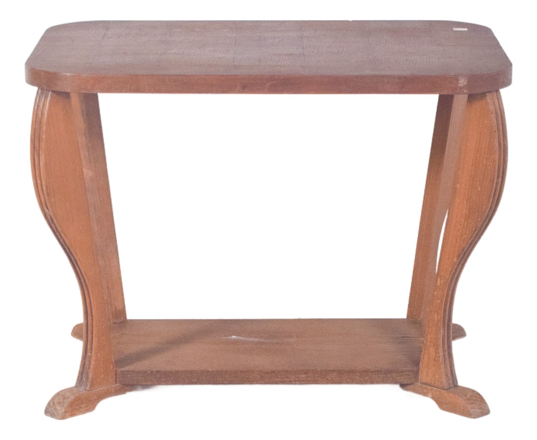 Vintage Portuguese Art Deco Coffee Table, 1920s: Art Deco coffee table. Marked by curved lines and softly sculpted legs, it has a rectangular top with rounded corners supported by four arched legs, connected by a lower plane that acts as a support s