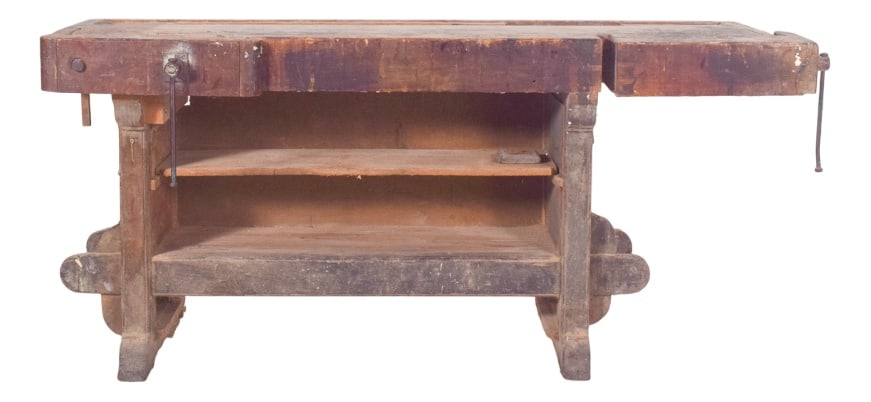 Portuguese Woodworkers Workbench, 1950s: Cabinetmaker's work bench. This cabinetmaker's bench is a solid and austere piece, a silent testimony to long days of manual labour. Made entirely of solid wood, it has a thick top marked by cuts,