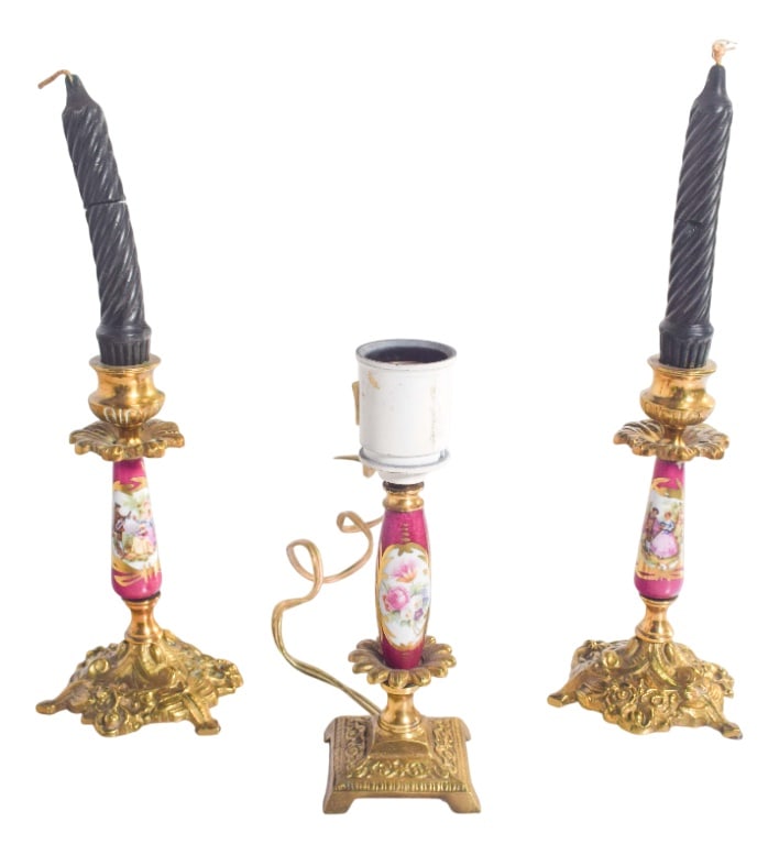 Table Lamp and Candleholders in and Metal, Set of 3: Lamp and two chandeliers in pottery and metal in the shape of candlesticks, where the base and candlestick are made of gilded wood. The porcelain is decorated in pink, with medallions in the center
