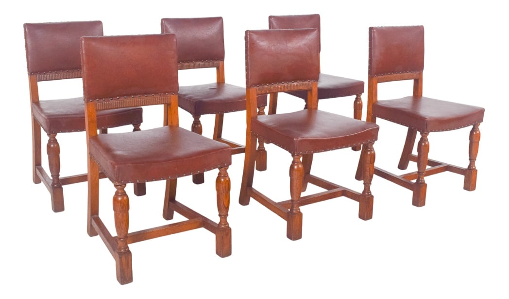 Chairs with Brown Leather Backs and Seats, Set of 6: Six chairs with brown leather backs and seats. The chairs are simple but elegant in style, with metal nails decorating and holding the edges of the upholstery, reinforcing the hold of the leather and
