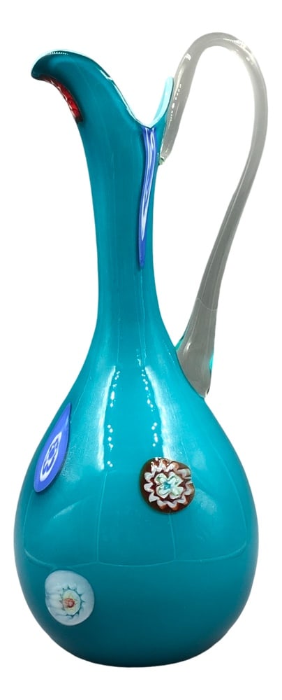 Murano Glass Fiorentina Murrini Glass, 1960s: This elegant, light blue Murano glass jug, made using the traditional Opalina Fiorentina technique, impresses with its artistic design and fine details. The surface is decorated with colorful murrini