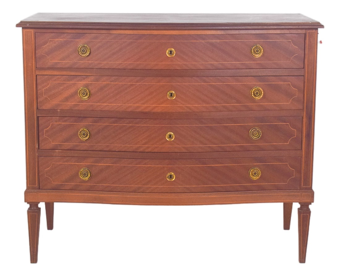 Portuguese Chest of Drawers: D. Maria style chest of drawers. An elegant chest of drawers with restrained decoration and a refinement characteristic of Portuguese furniture from the early 19th century. The slightly curved front