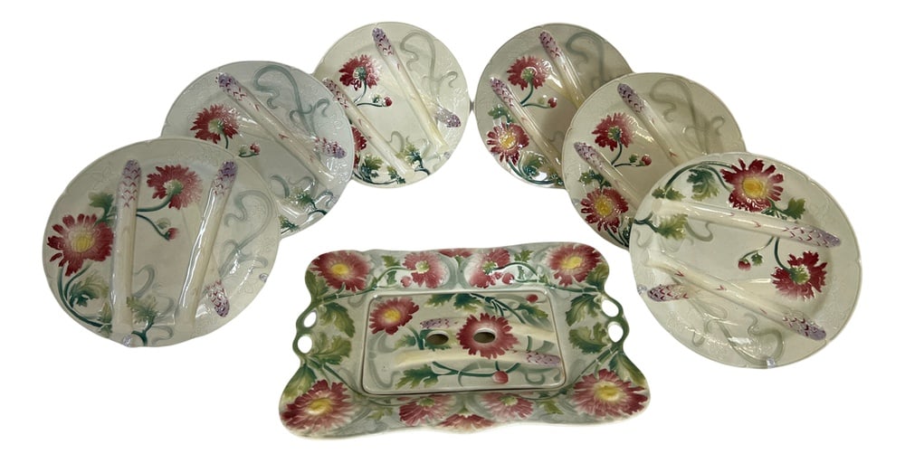 Plates with Dishse from Saint Clément, Set of 7: Discover this sumptuous slipware asparagus set by Saint-Clément, emblematic of 19th-century French elegance. Comprising six asparagus plates and a matching large dish with integrated