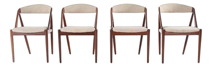 Teak Dining Chairs from Schou Andersen, Set of 4: Set of four teak dining chairs by Kai Kristiansen. Model 31. These Danish Mid-Century dining chairs were designed by Kai Kristiansen in 1960. Teak framed and original fabric upholstery. Set of 4 comfo
