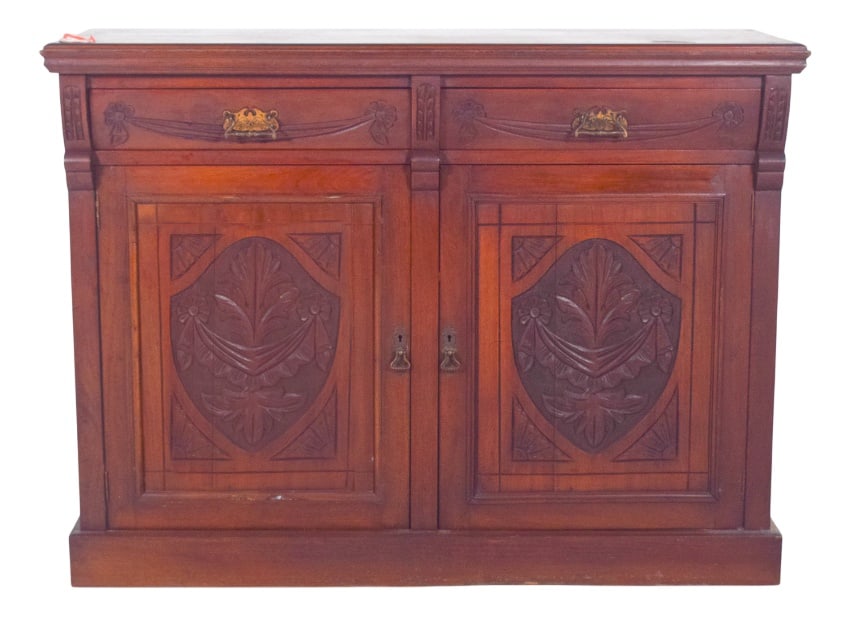 European Sideboard in Dark Wood: Sideboard with two different doors. In dark wood with richly detailed carvings on the front doors. Two large lower doors stand out, decorated with bas-reliefs framed by geometric shapes and central