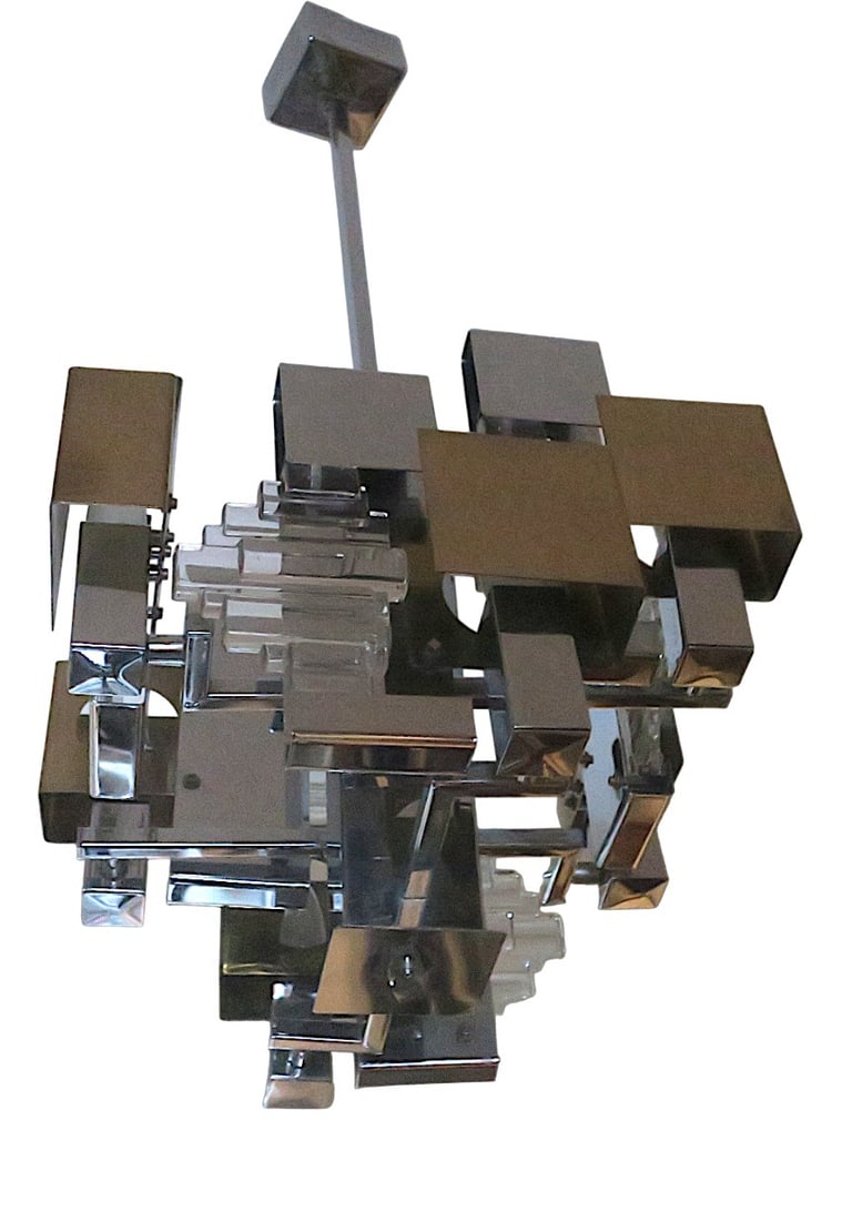 Chandelier in Glass from Gaetano Sciolari, 1960s: Impressive and rare Gaetano Sciolari Italian Modern chandelier in brass, glass and chromed metal, dating from the 1960s-1970s. Country of Manufacture: Italy Design Period: 1960 to 1969 Production Peri