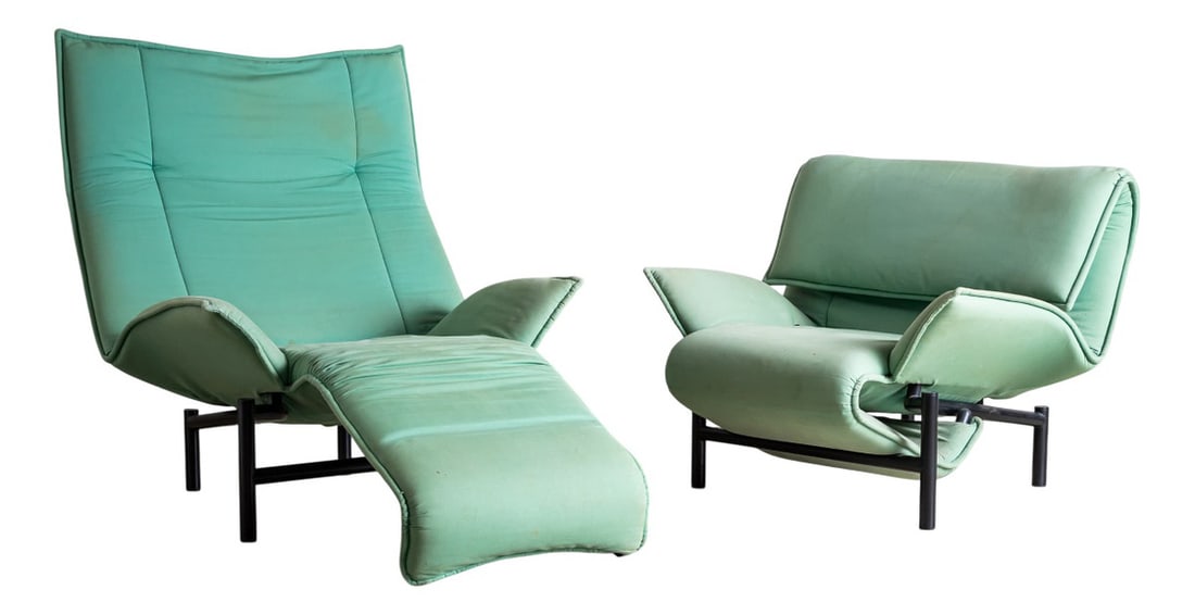 Veranda Chairs by Magistretti for Cassina, Set of 2: A pair of modern "Veranda" armchairs designed by Vico Magistretti for Cassina, produced in Italy in the late 20th century. The chairs rest on black metal frames and are upholstered in