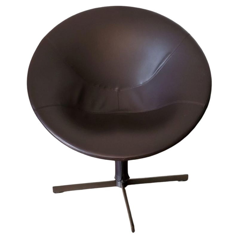 Armchair in Leather by Christophe Pillet for Zanotta: The dark brown leather swivel Hillroad armchair, designed by Christophe Pillet for Zanotta, fits perfectly into a lounge with a pop, Space Age style. This piece of furniture combines comfort and