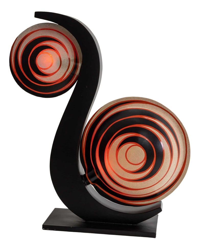 Large Italian Snail Shaped Table Lamp: Large table lamp with black s-shaped base and plastic lens-shaped lampshades with snail pattern in red, black and beige. Design Period: 1950 to 1959 Production Period: Unknown Restoration and Damage D
