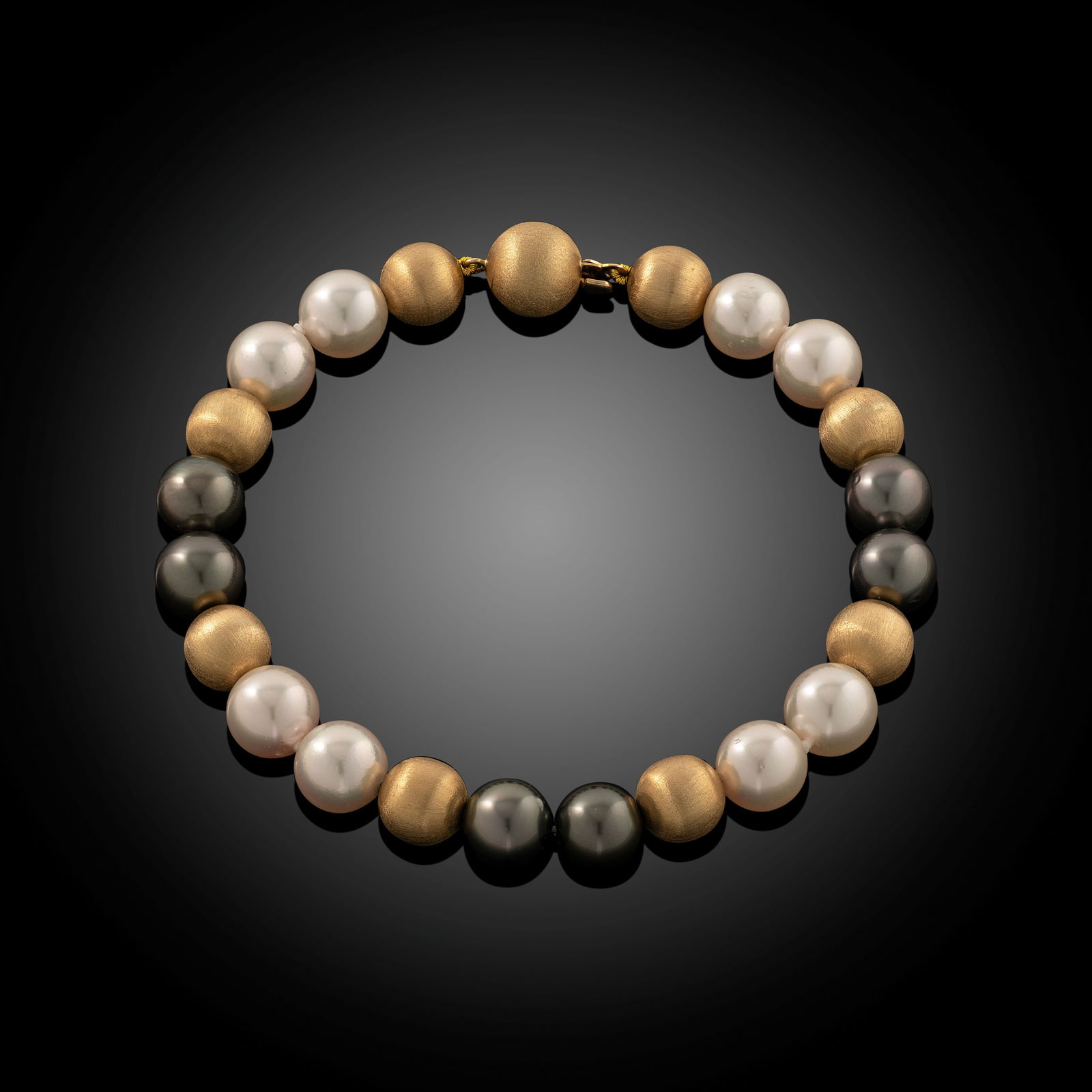 18 Carat Satin Gold Tahitian Pearl Bracelet: 18 carat white gold Tahitian pearl and diamond drop earrings with hoop fittings Length 8" Metal Type 18ct Yellow Gold Pearl Type Tahitian Pearl Size 8.0-9mm Diamond