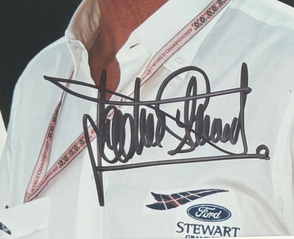 Jackie Stewart, Hand Signed Framed 25cm x 20cm Photo Presentation. COA Supplied On All Items Upon: Jackie Stewart, Hand Signed Framed 25cm x 20cm Photo Presentation. COA Supplied On All Items Upon Request.