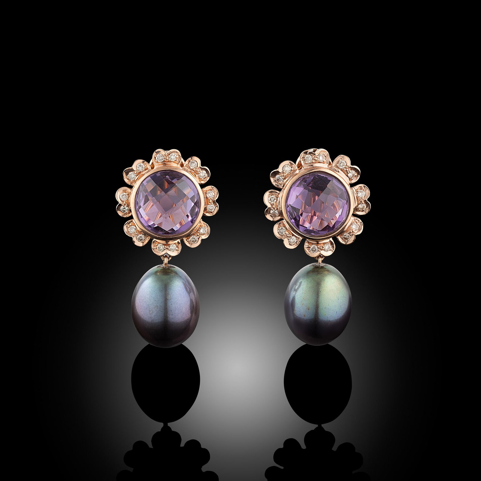 14 Carat Rose Gold Freshwater Pearl, Diamond And Amethyst Earrings: 14 carat rose gold Freshwater pearl, diamond and amethyst drop earrings with clip Metal Type: 14ct Rose Gold Pearl Type: Freshwater Pearl Size: 10.5-11mm Diamond Weight: N/A Condition: Unworn Gross We