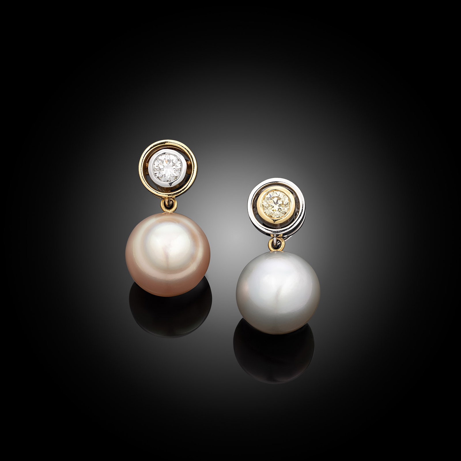 18ct 2-Tone South Sea Detachable Pearl & Diamond Studs: 18ct 2-tone South Sea natural colour detachable pearl studs with white and fancy colour round diamond tops Item Length: N/A Drop Length: 20mm Metal Type: 18ct 2-Tone Pearl Type: South Sea Pearl Size: 