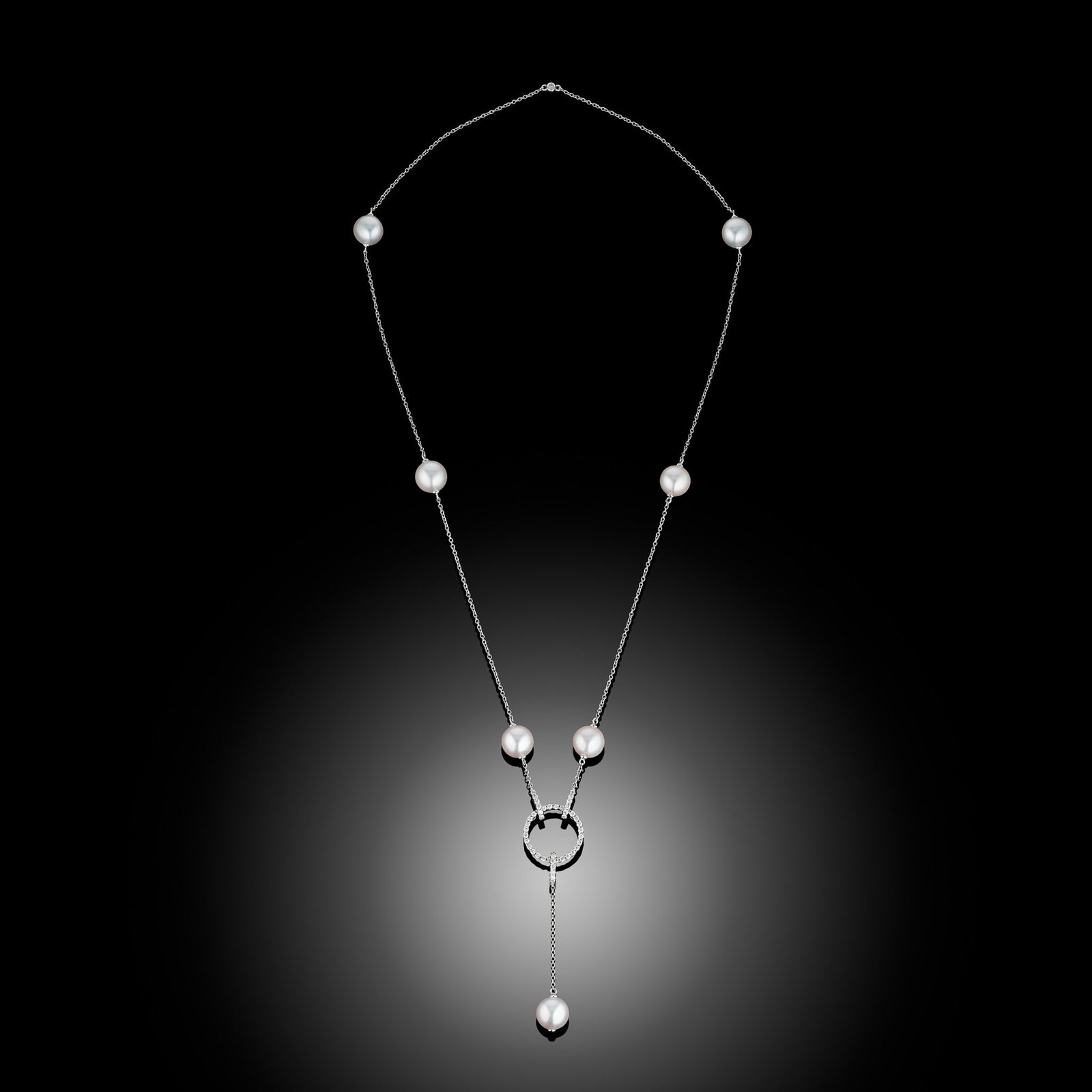 18 Carat Akoya Pearl And Diamond Detachable Necklace: 18 carat white gold Akoya pearl and diamond necklace with 3 detachable clips Length 18" Metal Type: 18ct White Gold Pearl Type: Akoya Pearl Size: 8.5-9mm Diamond Weight: 0.68cts Condition: Unworn Gros