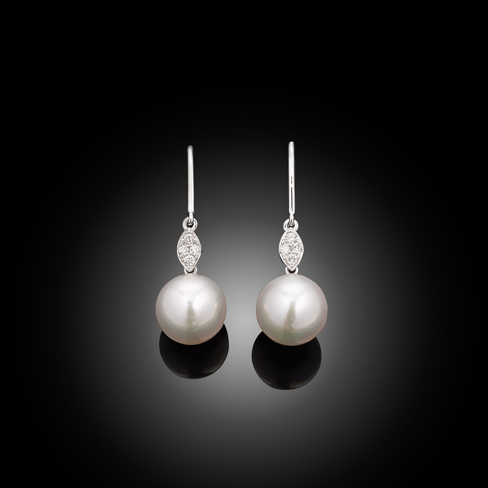 18ct White Gold Akoya Pearl & Diamond Hook Earrings: 18ct white gold diamond set hook earrings with round Akoya pearls Item Length: N/A Drop Length: 25mm Metal Type: 18ct White Gold Pearl Type: Akoya Pearl Size: 8.5-9mm Diamond Weight: 0.08cts Condition