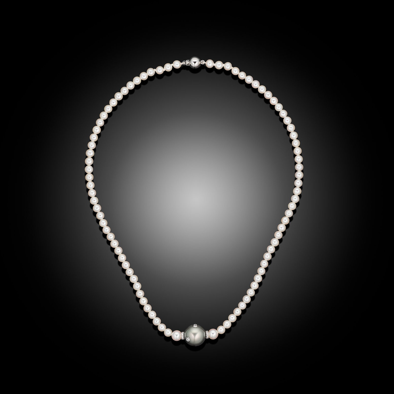 18ct White Gold Akoya & Tahitian Pearl & Diamond Necklace: 18ct white gold Akoya pearl strand necklace with diamond rondelles and diamond studded Tahitian centre pearl Item Length: 16inch Drop Length: N/A Metal Type: 18ct White Gold Pearl Type: Akoya & Ta