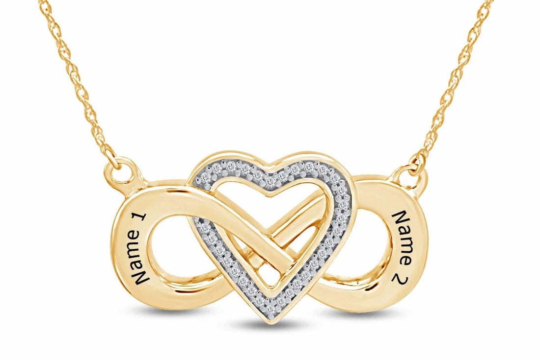GOLD-TONE INFINITY HEART PENDANT NECKLACE WITH COLORLESS ACCENTS: GOLD-TONE INFINITY HEART PENDANT NECKLACE WITH COLORLESS ACCENTS Description: A gold-tone pendant combining an infinity symbol with a central heart outlined by small colorless stones, with engraved