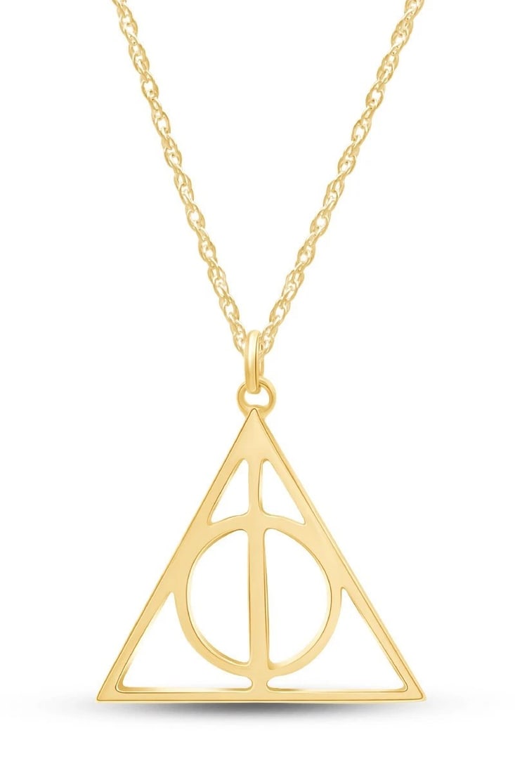GOLD-TONE GEOMETRIC TRIANGLE PENDANT NECKLACE: GOLD-TONE GEOMETRIC TRIANGLE PENDANT NECKLACE Description: A polished gold-tone pendant formed as an open triangular emblem incorporating a central circular element and intersecting linear geometry,