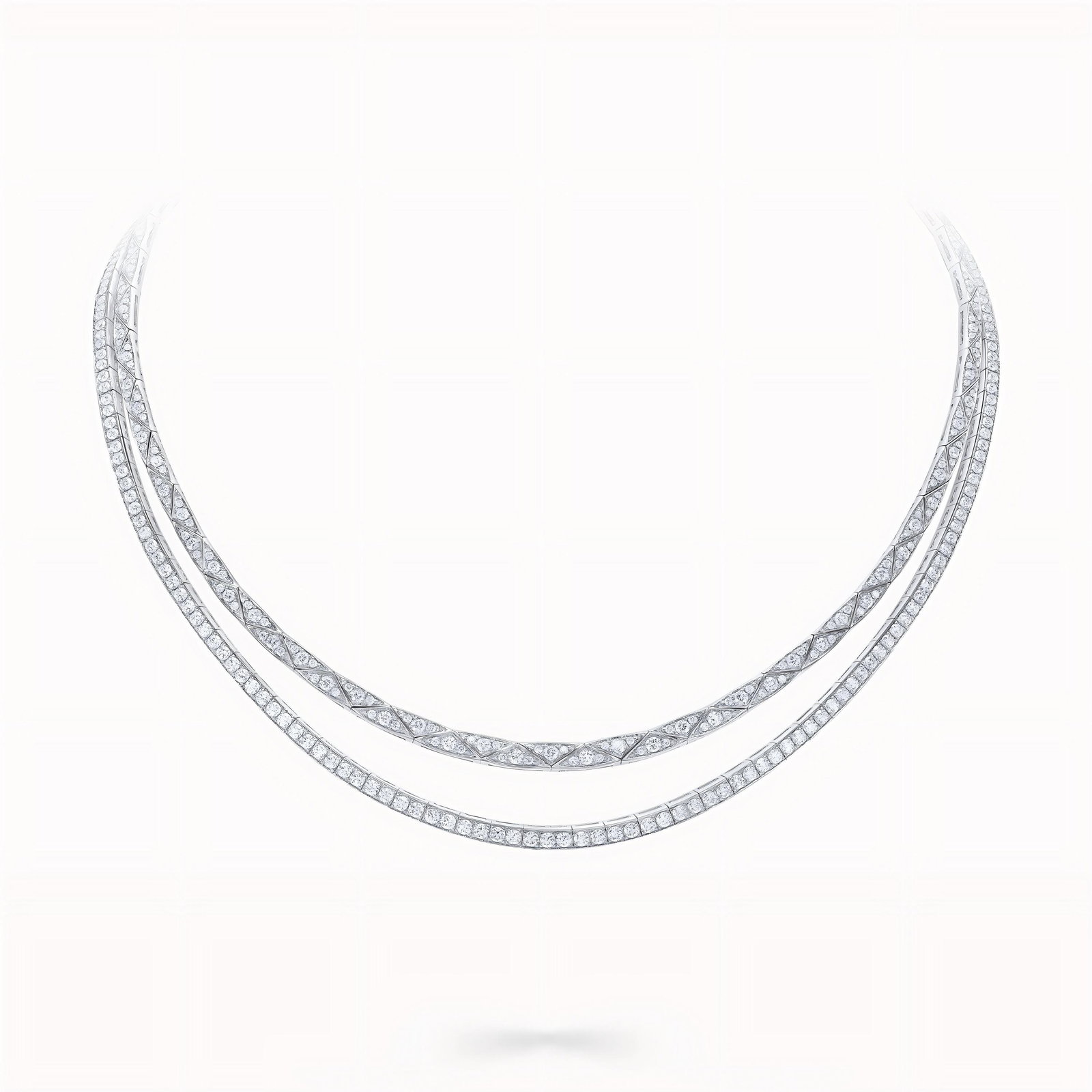 DIAMOND DOUBLE ROW COLLAR NECKLACE: DIAMOND DOUBLE ROW COLLAR NECKLACE Description: The lot consists of a rigid collar-style necklace set with numerous brilliant-cut diamonds arranged in two elegant rows forming a sweeping curved silhou