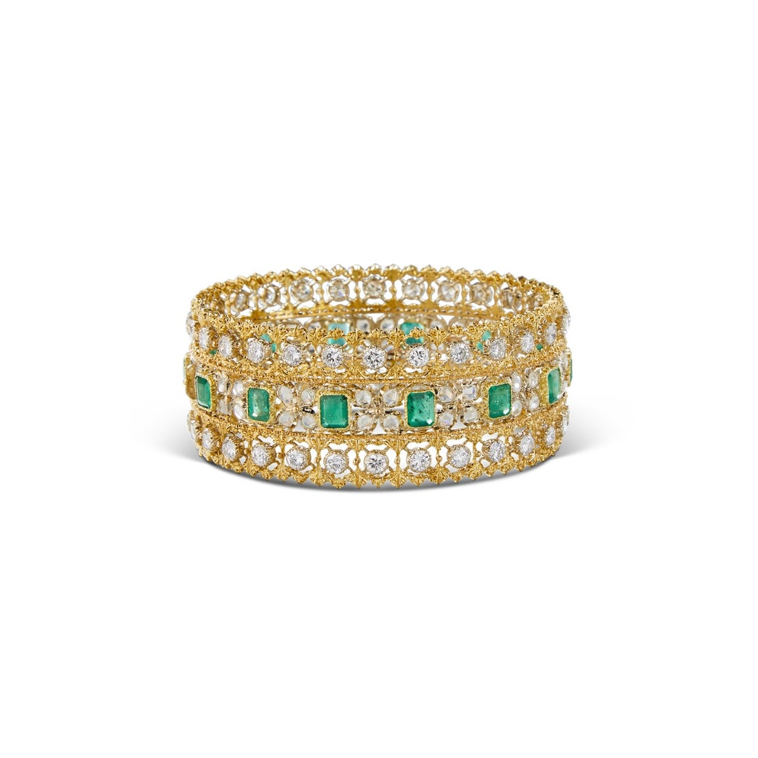 EMERALD AND DIAMOND BAND RING: EMERALD AND DIAMOND BAND RING Description: A wide band ring set with rectangular green stones and rows of small white stones. The images show the ring face and profile for catalogue reference.