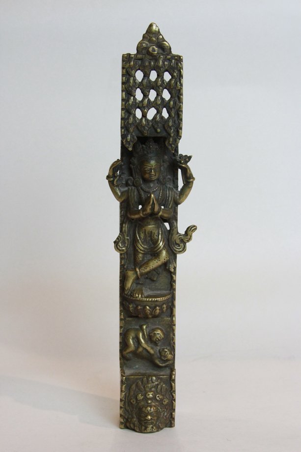 An Unusual Tibet Buddha: A Chinese antiques bronze Buddha H:8 7/8" W: 1 1/4" D: 1 5/8" Weight: 476g.