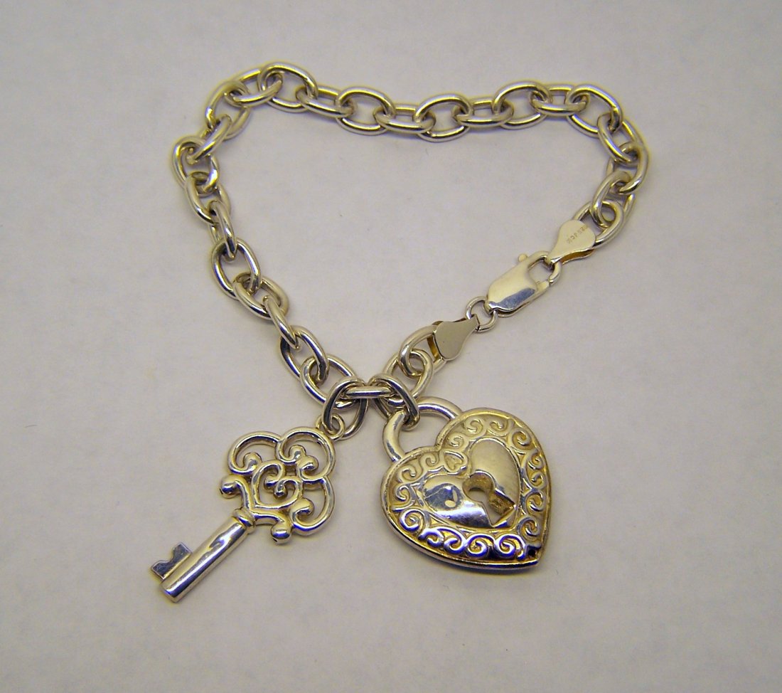 mauritius sterling silver charm bracelet (1 of 2)