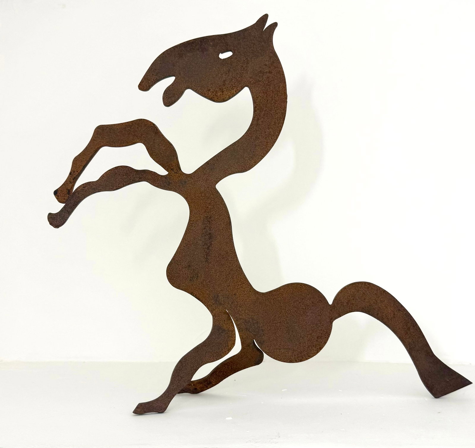 Menashe Kadishman, Israeli - Jewish, Prancing Horse, Iron Sculpture: Menashe Kadishman Prancing Horse, iron sculpture, 48x52x10 cm, iron thickness 0.5 cm. Signed. Quality work! Kadishman (1932-2015) was an Israeli painter and sculptor, winner of the Israel Prize in scu