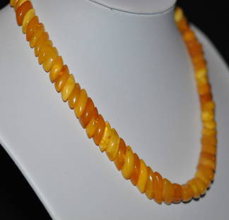 Antique Natural Butterscotch Egg Yolk Amber Necklace: Antique Natural Butterscotch Egg Yolk Amber Necklace; Measurements: the length is 48 centimeters the biggest amber measures 21 x 10 x 5 mm; Weight is 36.7 grams