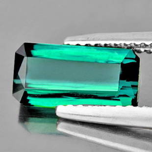 Natural Teal Green Tourmaline 4.37 Cts: Natural Green Tourmaline WEIGHT : 4.37 cts SHAPE : Rectangle SIZE ( L x W x D ) : 13.44 x 6.14 x 5.30 mm QUANTITY : 1 pieces COLOR : Neon Green Blue (Teal Green) ORIGIN : Brazil HARDNESS : 7 LUSTER :