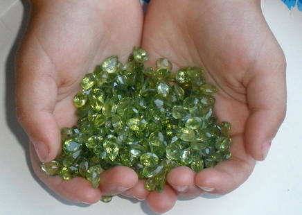 Natural Peridot 50 carats: Natural Peridot 50 carats.............mixed size from 0.25 carats to 2 carats. 4 mm to 8 mm size.... natural earth mined...no treatment in any way.