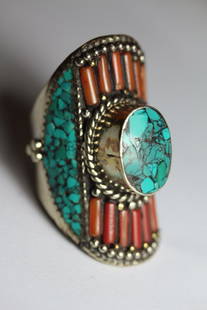 Tibet Hand Made Turquoise & Coral Ring: Tibet Natural Stone Hand Made Turquoise, Coral ring....size 8.......This elegant ring was handcrafted in Tibet, the home of exquisite jewelry craftsmanship. It was skillfully made with natural