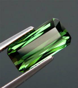 Natural Green Tourmaline 3.74 ct - VVS: Natural Green Tourmaline............... Shape- Emerald cut;Clarity- VVS Dimensions[mm]; 12.2x6.3x4.9 [approx];Weight -3.74ct.[1pc]; Treatment- Not at all;Color- Green Hardness; 7-7.5;Luster- Glowing;