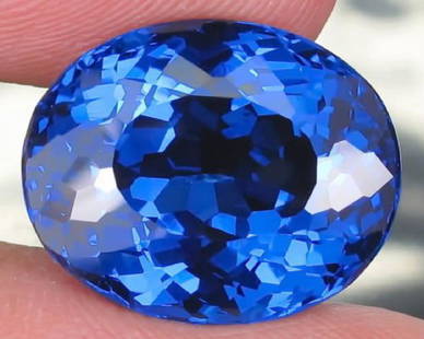 Natural London Blue Topaz 18.25 carats- VVS: Natural London Blue Topaz 18.25 carats- VVS;.SHAPE: Oval ; COLOR: LONDON BLUE;TREATMENT: IRRADIATION;LUSTER: RADIANT; ORIGIN: BRAZIL; Blue Topaz - reflects the energy of the mind and knowledge,