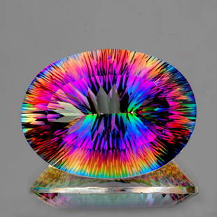 Natural Rainbow Mystic Quartz 29.05 Cts - VVS: Natural Mystic Topaz Quartz........... WEIGHT : 29.05 cts; SHAPE : Oval (Concave Cut); SIZE ( L x W x D ) : 25 x 18 mm; QUANTITY : 1 pieces ; COLOR : AAA Multi Color; CLARITY : Flawless-VVS1; ORIGIN :