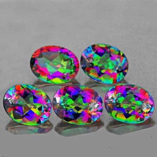 Natural Rainbow Mystic Topaz 4.80 carats: Natural Rainbow Mystic Topaz 4.80 carats.....flawless/vvs......perfectly matched pairs in size 7 x 5 mm; 5 pieces; mystic rainbow color; hardness 8; origin - Brazil