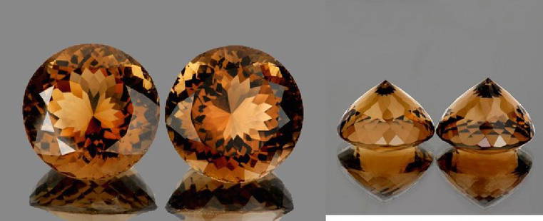 Natural Smoky Topaz Pair 46.03 Carats - VVS: Natural Smoky Topaz; WEIGHT : 46.03 cts; SHAPE : Round.... SIZE ( L x W x D ) : 19.00 mm; QUANTITY : 2 pieces (Perfectly Matched Pair) COLOR : Champagne; CLARITY : {Flawless-VVS1}; ORIGIN : Brazil;