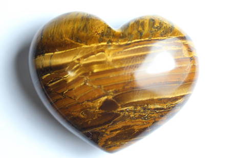 Natural Tigers Eye Heart 259.97 carats: Natural Tigers Eye Heart 259.97 carats......completely Natural.....no treatment in any way... .......Benefits - Tigers Eye Stone is a crystal with lovely bands of yellow-golden color through it. This