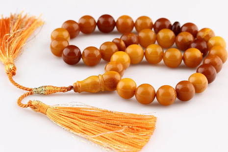 Natural Amber Islamic Prayer 33 Beads Tasbih: Natural Amber Islamic Prayer 33 Beads Tasbih.....Description: Excellent vintage style genuine Baltic amber Islamic 33 prayer made of round shape beads.Size: It weighs 31.7 grams. Diameter of round