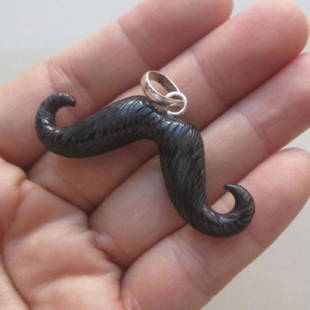 Natural hand Carved Mustache Pendant: Natural hand Carved Mustache Pendant from Buffalo Horn...Size : 20 mm x 50 mm