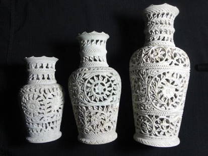 Vase - hand carved soap stone art work: Hand carved soapstone set of 3 vases....very finely carved....6", 8" & 10"....msrp 2500