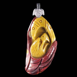 Hand Craved Eagle Pendant: This is a hand carved Eagle Pendant*Stone Name Mookaite *Overall Dimension 74x30x14 mm (2.913x1.181x0.551 inch )mm *Weight 155 ct/ 31 g/ 1.093494 oz *Mohs Hardness 6-7 *Source Natural *Treatments
