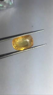 Natural Yellow Cushion Sapphire 5.80 Carats: Natural Yellow Cushion Sapphire 5.80 Carats..SI..size 11 x 7 mm....100% natural earth mined....gently heated only. Origin - Ceylone.