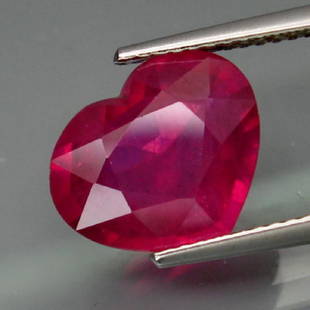 Natural Pinkish Red Ruby Mozambique HEART 4.65 Cts: SHAPE :Heart ShapeWEIGHT :4.65 Ct.;SIZE :11.9 X 10 X 4.8 Mm.;QUANTITY :1 Piece;COLOR :Top Pinkish Red;CLARITY :Transparent;LUSTER :Superior;ORIGIN :Mozambique, Africa;TREATMENT 