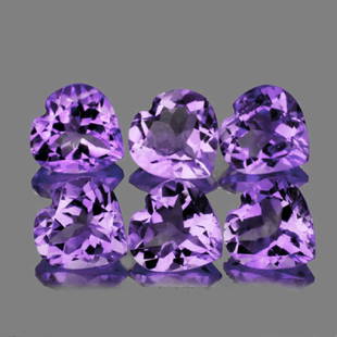 Natural Purple Heart Amethyst 10 mm - VVS: Natural Purple Heart Amethyst 10 mm - VVS......Origin - Brazil; Total Pieces - 6; Carat Weight 15-16 carats Approx;Hardness:7; Amethyst is a powerful and protective stone. It guards against psychic